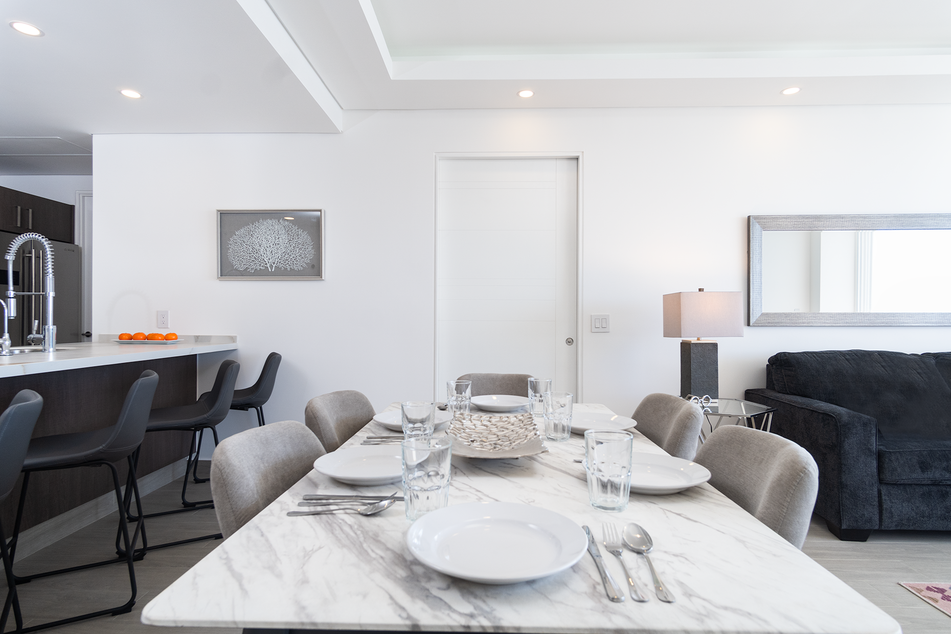 Elegant granite dining table accommodates 6.