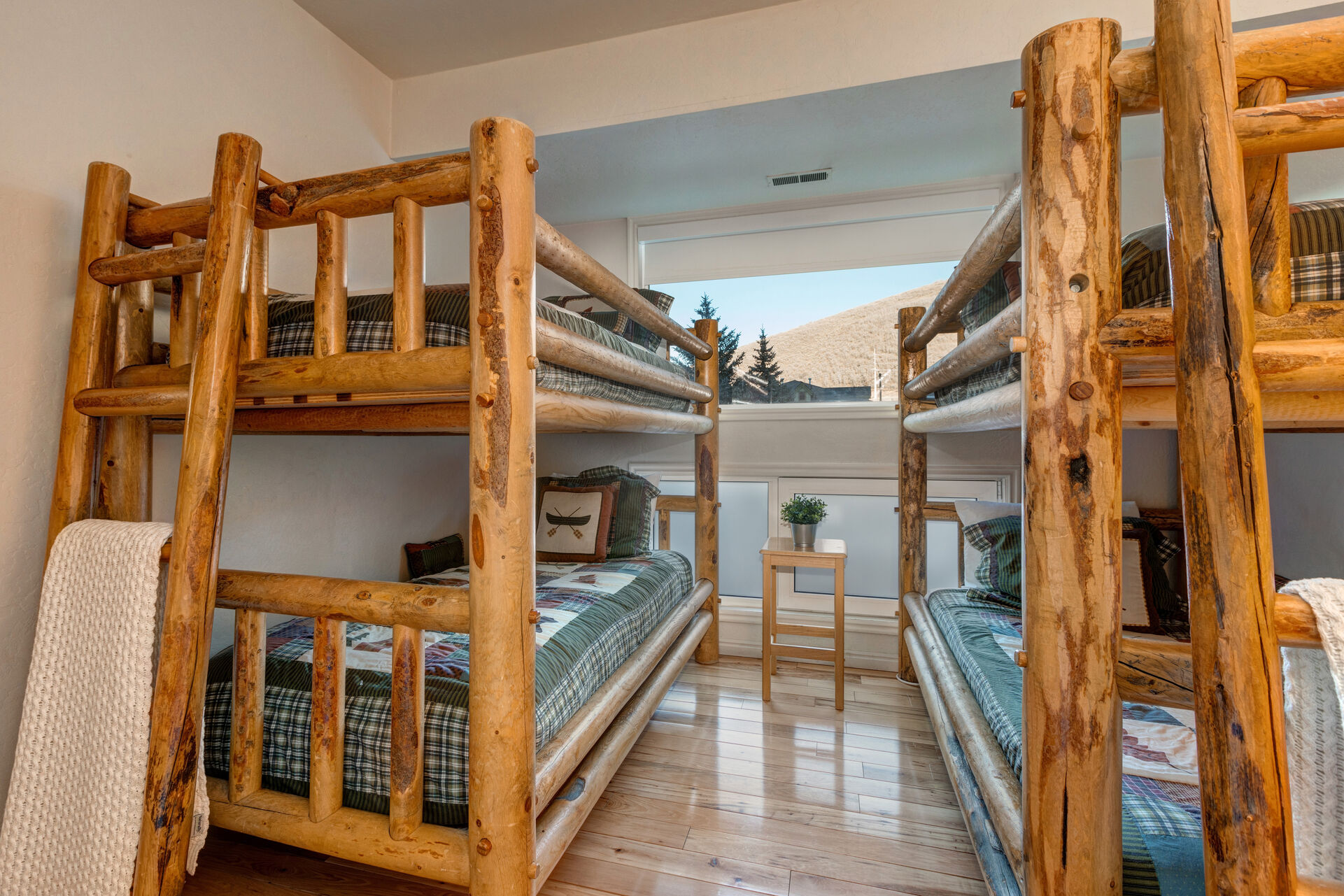 Lower Level Bedroom 2 with two twin over twin bunk beds and full bath access