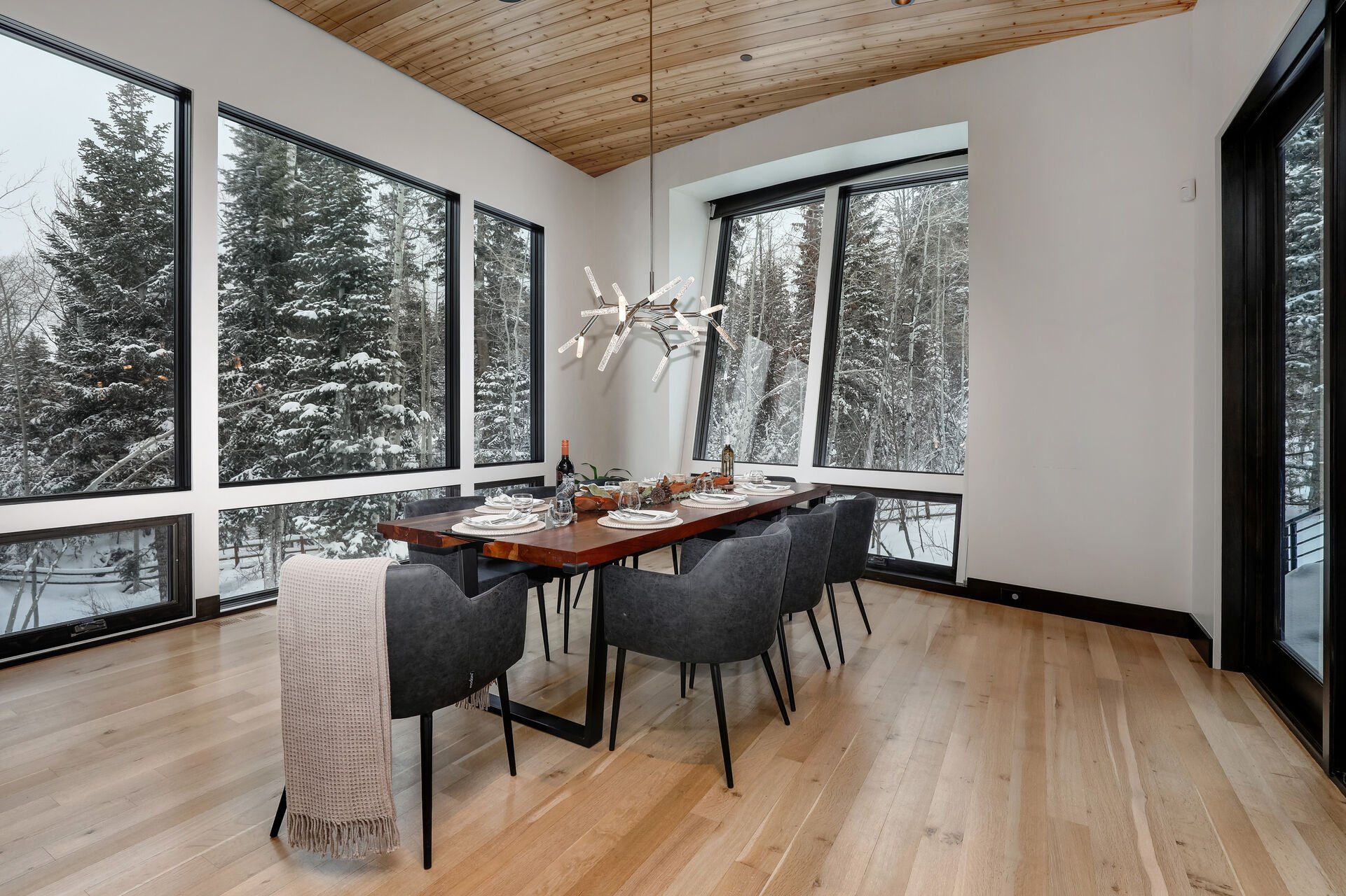 Dining Room with stunning floor to ceiling windows and seating for 8