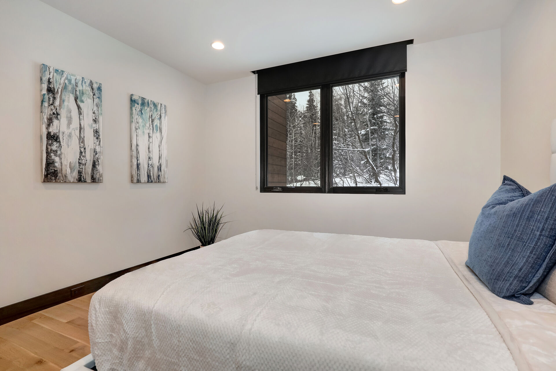 Main Level Bedroom 2 with queen bed and en suite bathroom