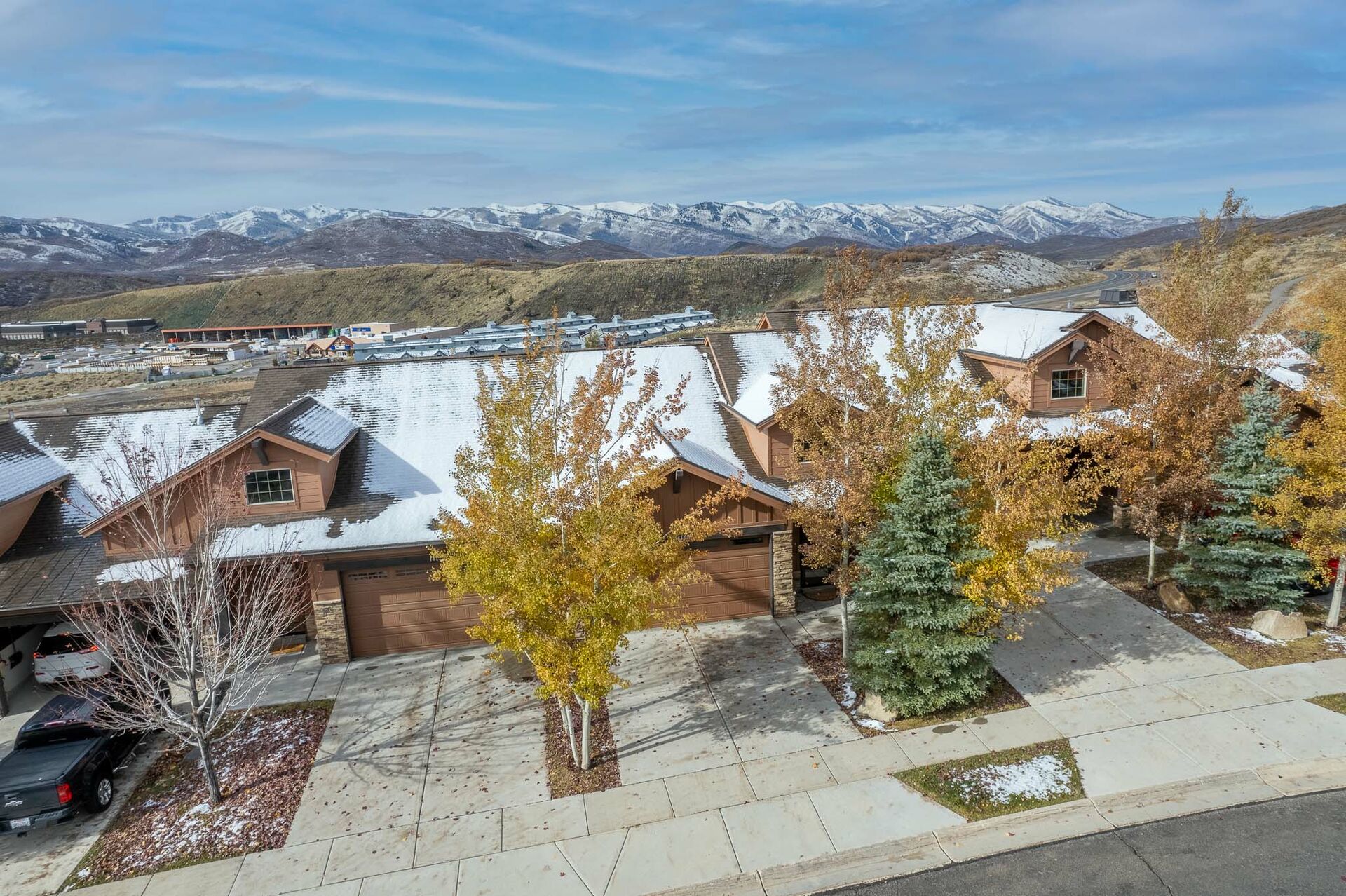 Aerial view of driveway looking out at mountains
