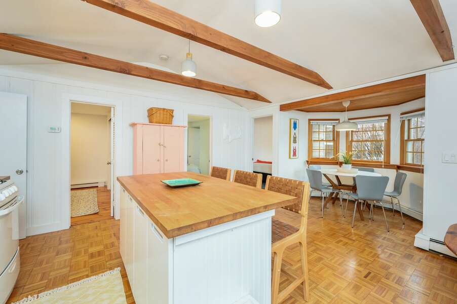 Kitchen is open to dining to keep the conversation going - Bass Cove Compound-24 Follins Pond-Dennis-Cape Cod