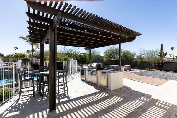 Outdoor kitchen and seating area!