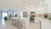 All white Kitchen with stainless appliances