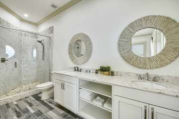 Bathroom adjacent to King bedroom with Gulf view, double vanity with stand up shower