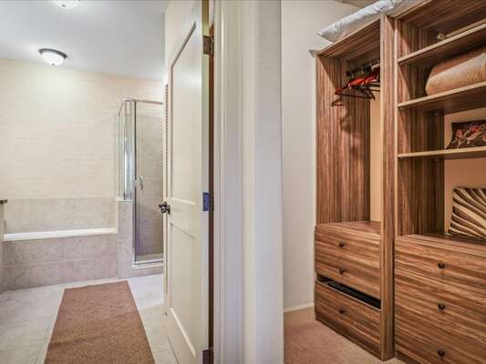 En-suite bathroom with a separate tub and walk-in shower