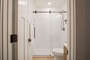 This is the shared bathroom in the hallway! It does not have a tub.