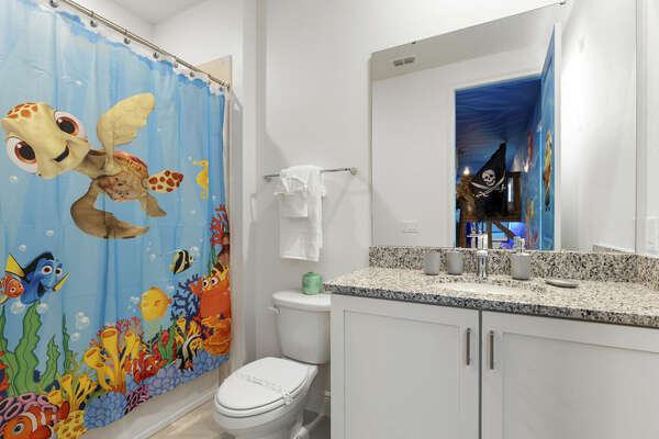The underwater-themed bedroom features two en suite bathrooms