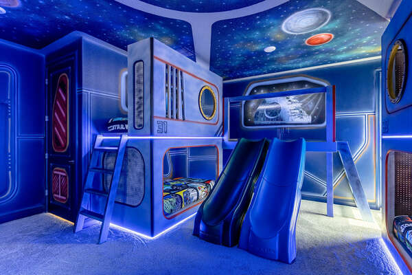 Little explorers can find themselves venturing to outer space in the galaxy-themed bedroom.