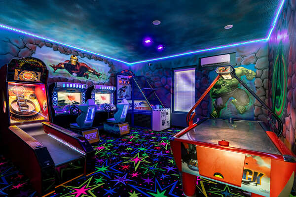 Kids of all ages will enjoy the arcade games in this superhero-themed game room!