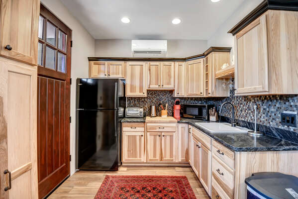 Casita Kitchenette with a Refrigerator, Toaster Oven, Coffee Maker, and Microwave