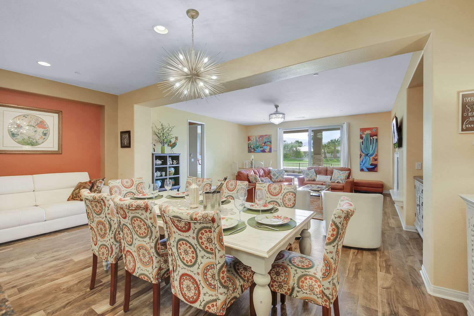 The casual dining area features a dining table with seating for eight.