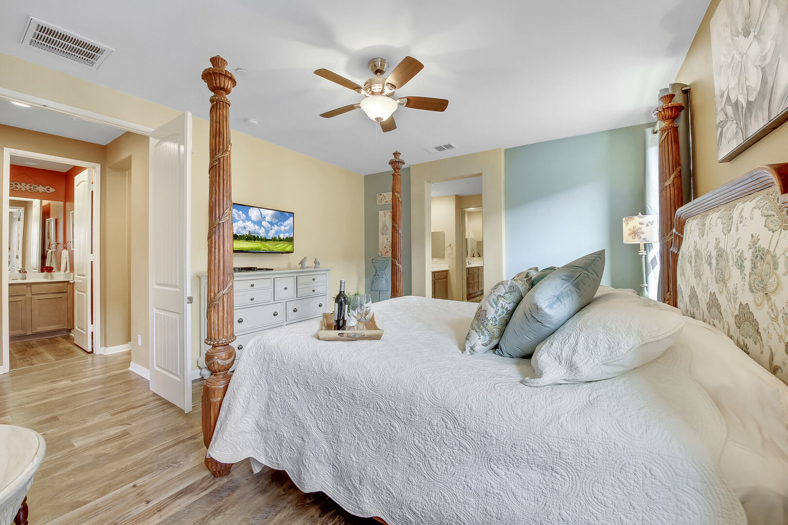Master Suite 1 is located to the right of the entryway and features a Cal King-sized Bed.