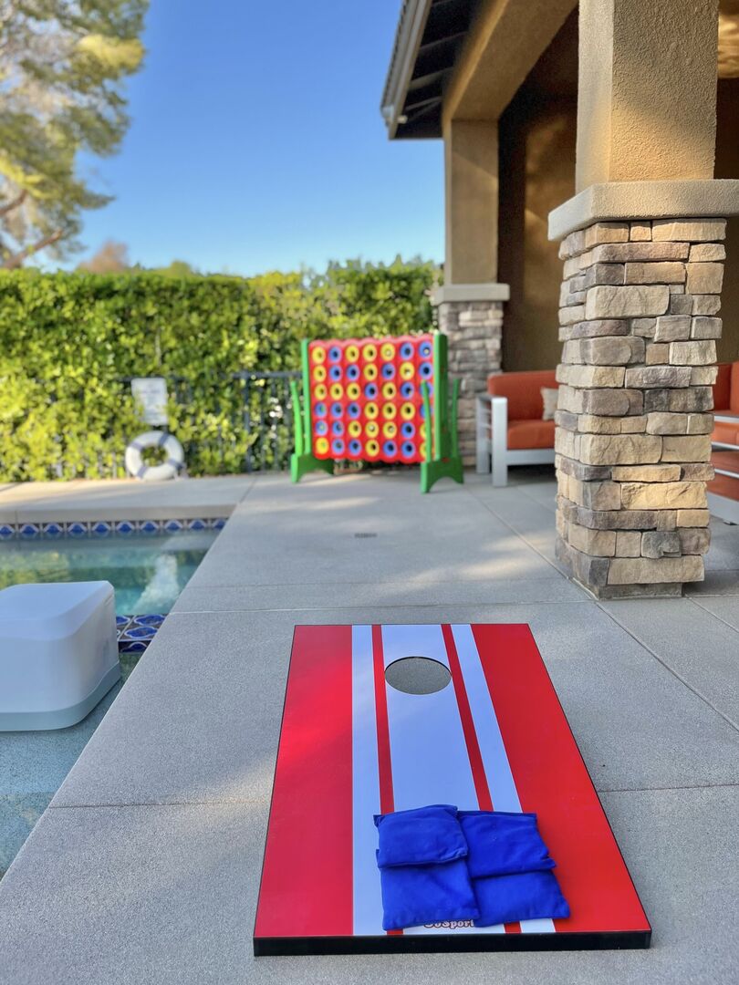 After you've won in bean bag toss, rematch on the Giant Connect 4.