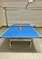 This ping-pong table may be stowed to the side to ensure you may park your vehicles in garage!