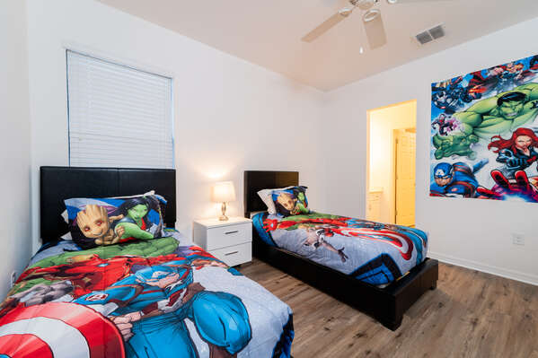 Bedroom 4 has twin beds and an action hero theme