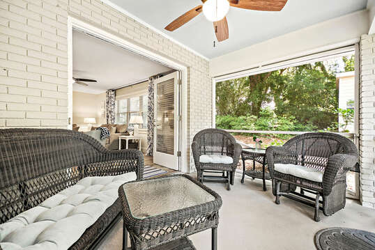 The screened-in porch is just right for relaxing.