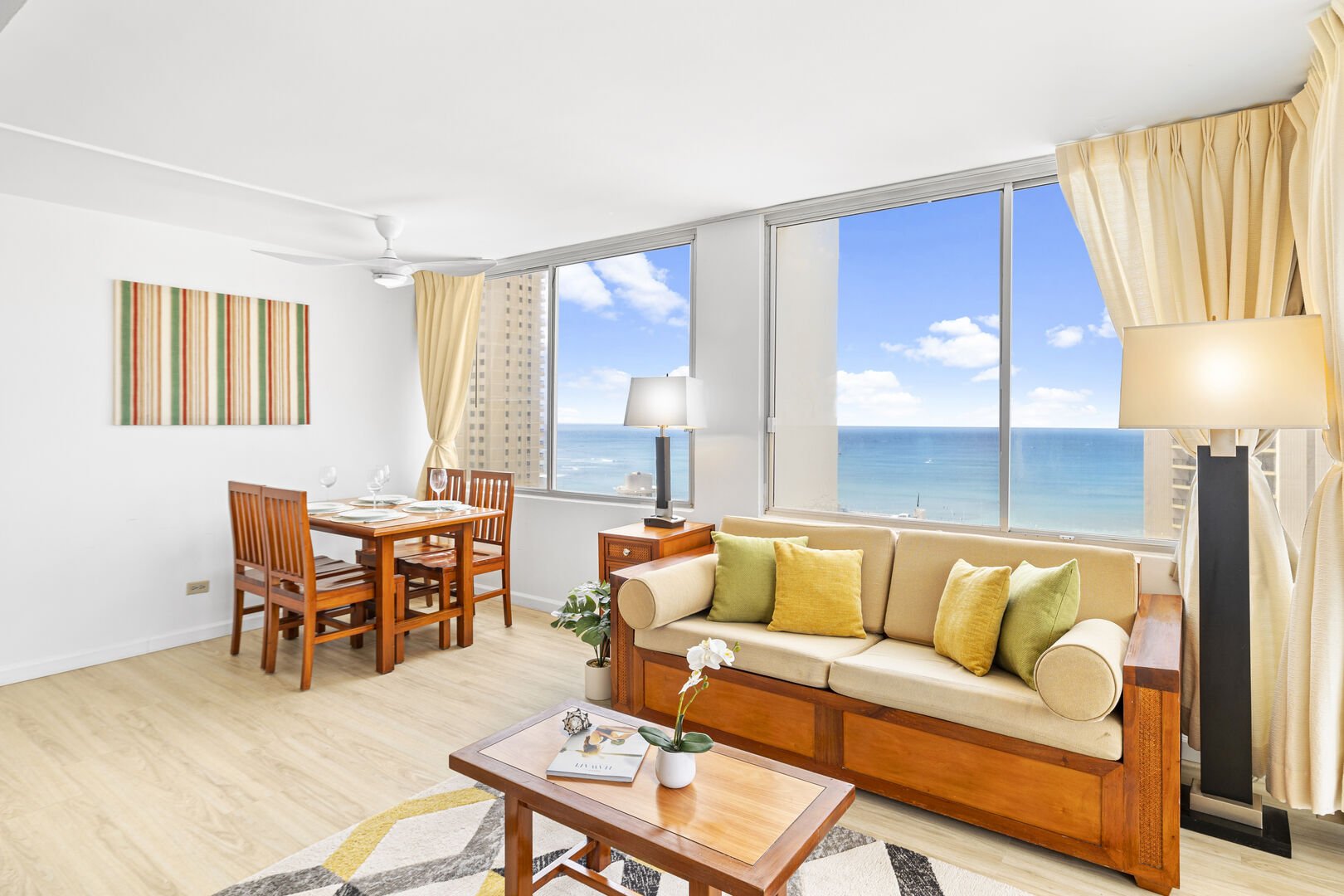 The living room features a pull-out sleeper sofa and dining area with 4 chairs! Enjoy the view of the ocean view!