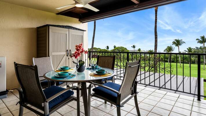 Lanai dining table with ocean and golf course views