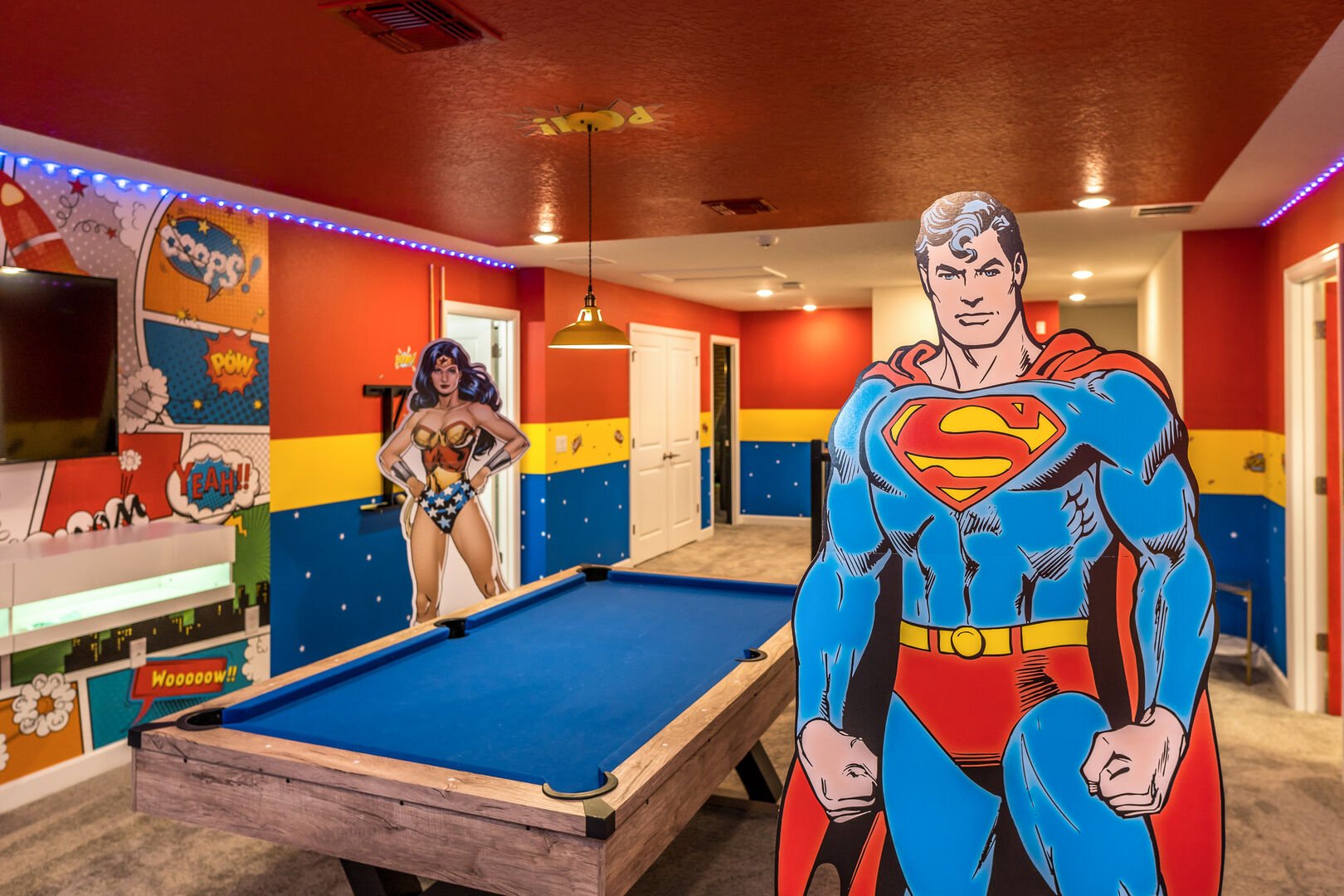 Justice League making sure you're having a great time in the game room!