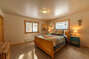 Down the mid-level hallway, you'll find two spacious Bedrooms
