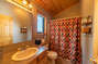 The En Suite Bathroom features a standard vanity, toilet and bathtub/shower combo.