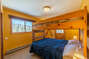 Bedroom 2 offers access to the elevated deck with it's breath taking tree top views.