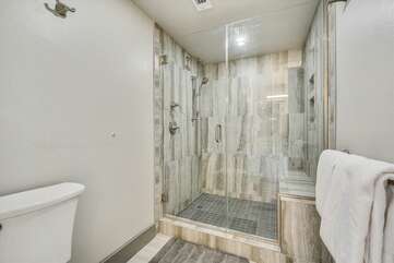 Master bathroom with custom tiled shower.