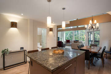 Open concept kitchen dining and living area