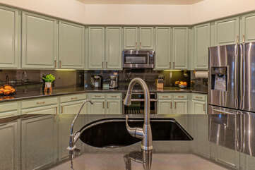 It's a pleasure working in a kitchen with newer appliances and a large utility sink.