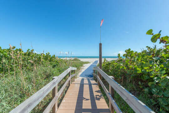 Walk right out to the beach using the private walkway.