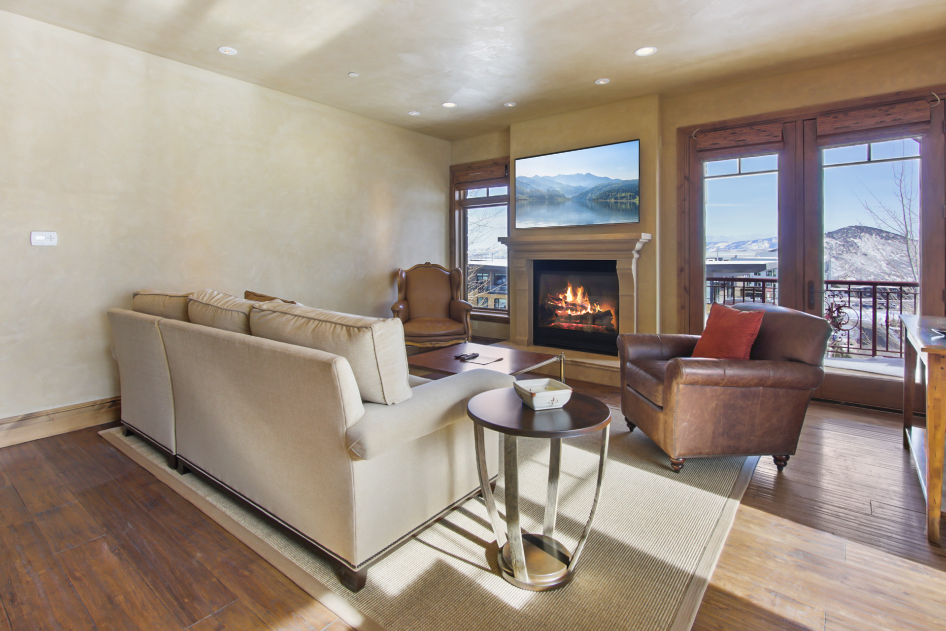 Living room with flatscreen TV and fireplace