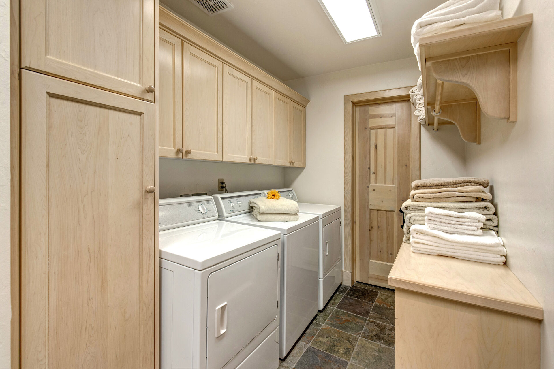 Lower Level Laundry Room with utility sink