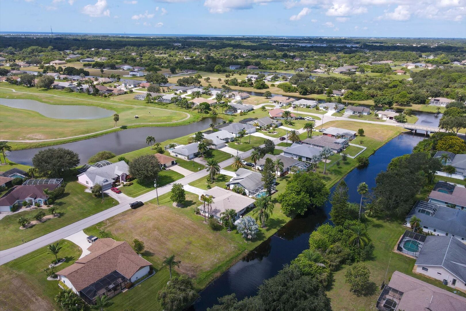 Aerial view of house and canal