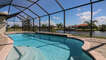 Gorgeous South Gulf Cove canal home with private pool