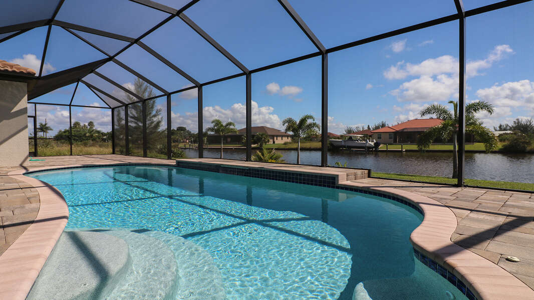 Gorgeous South Gulf Cove canal home with private pool