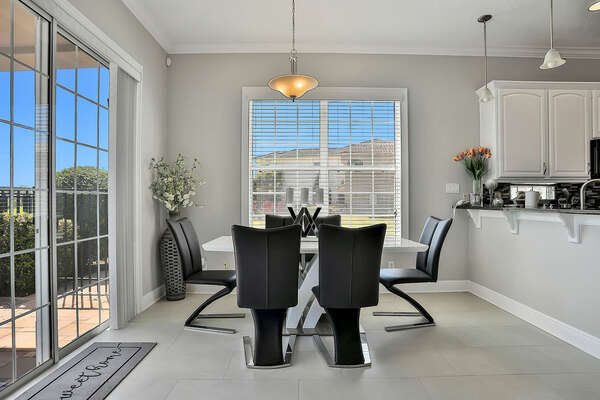 Gather around the dining room table with seating for 6 to enjoy meals together.