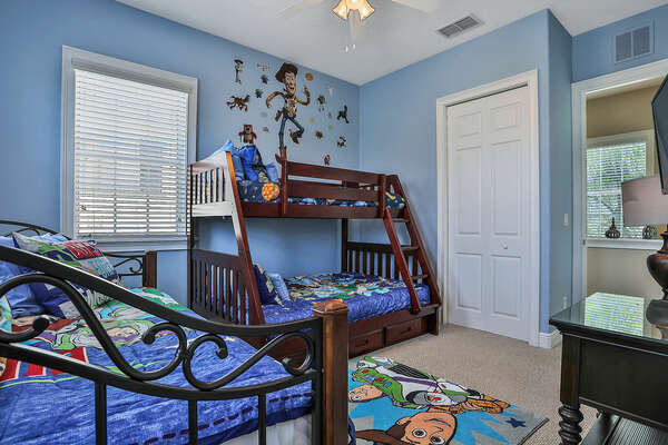 This room features a twin/double bunk bed and a twin daybed.