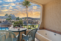 Stunning views from the upstairs patio include a jacuzzi tub.