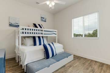 Guest bedroom with bunk bed and pull out bed