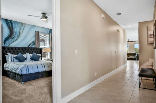 On the ground floor, there is a master suite with king-sized bed and en suite