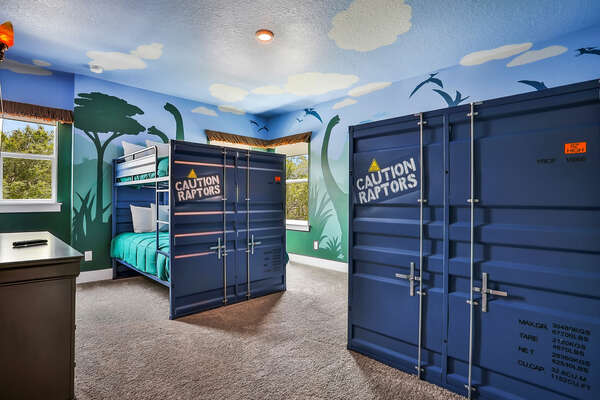 Kids will delight in this dinosaur-themed bedroom with 2x double/double bunk beds and en suite