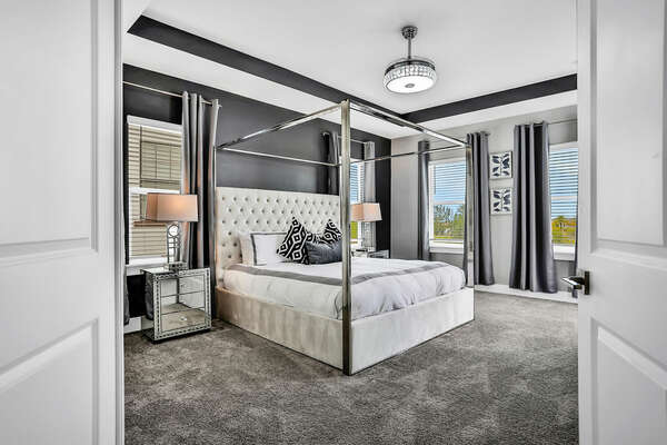 This spacious master suite with king-sized bed has a large en suite with shower and separate tub