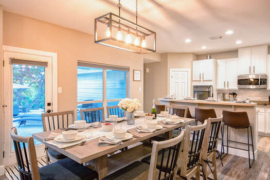 Great 8-seat dining area, 4-seats at center island and well stocked kitchen