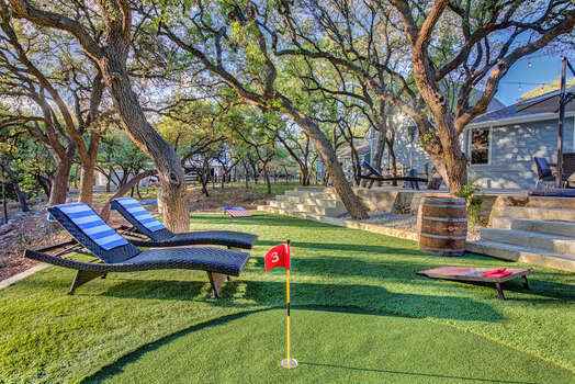 The pulling green and chipping area also has lounge chairs, corn hole, bocce ball and dice games too