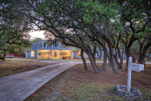 Large front yard and completely renovated Hill Country home that is resort-style living at it's best.