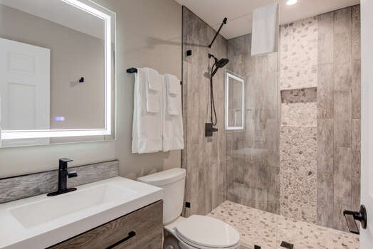 Renovated second bathroom attached to second bedroom