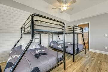 3rd level bedroom with sleeper sofa, bean bags and 2 twin over full bunks