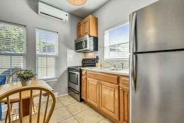 Full sized kitchen on the lower level that is completely furnished for guests