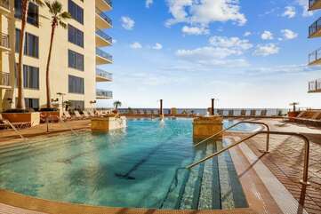 Outdoor pool on the 4th floor with balcony view of the Gulf, perfect for sunset!